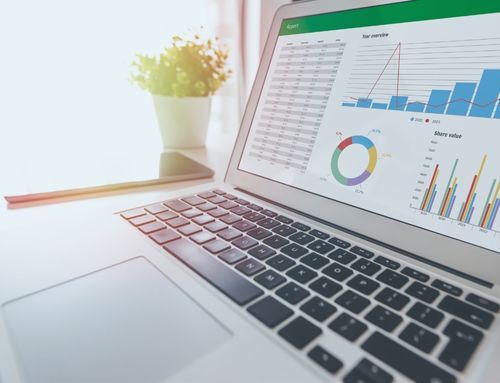 Laptop screen with data charts, illustrating Gysho’s use of AI-driven analytics to evaluate and optimise procurement proposals.